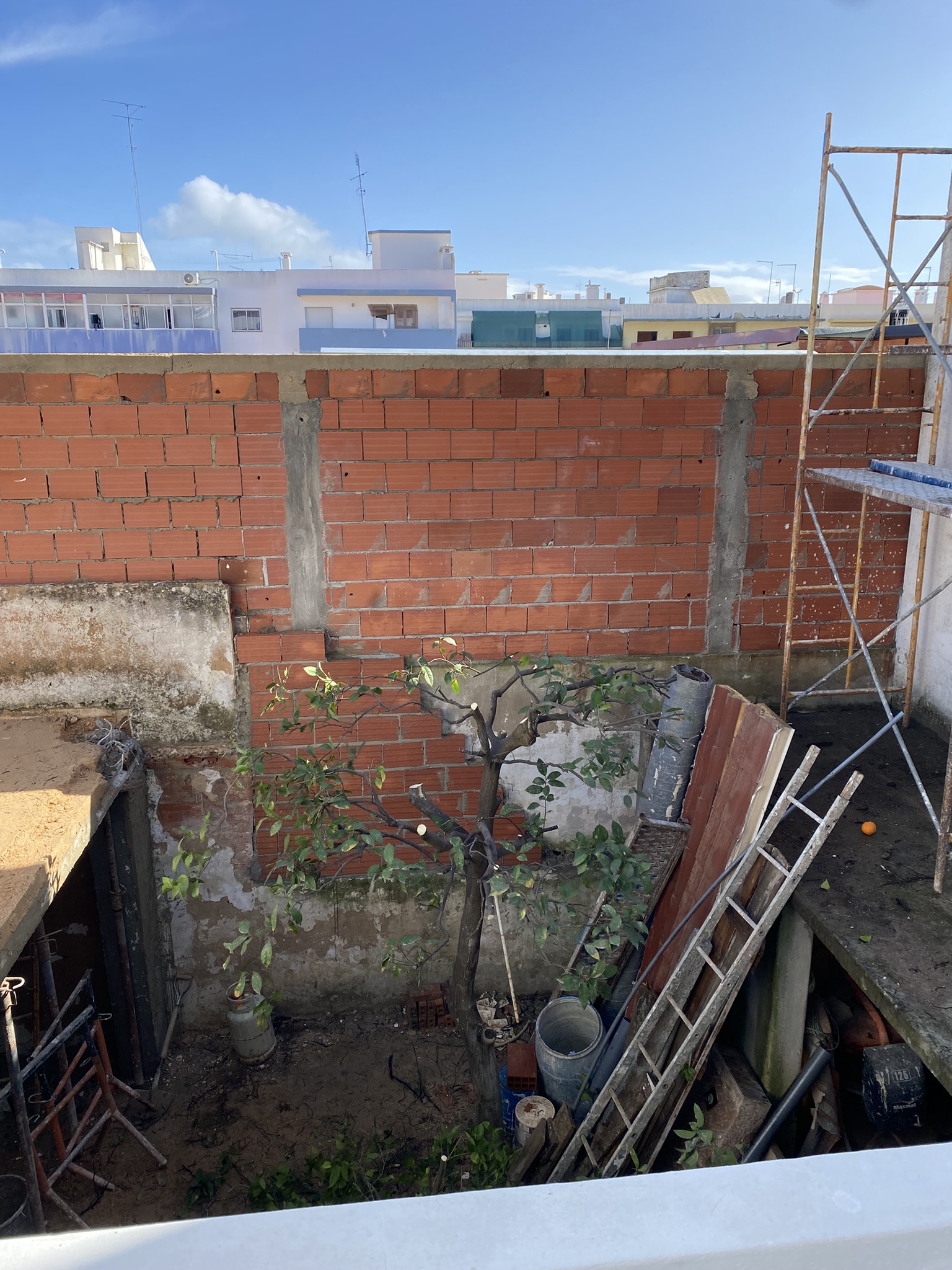 West wall rebuilding for stairs prep